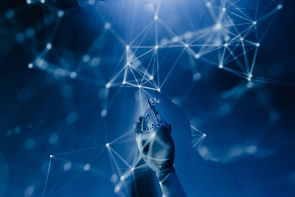 RISE OF DIGITAL MARKETING TRENDS IN 2026 A robotic hand reaching into a digital network on a blue background, symbolizing AI technology.